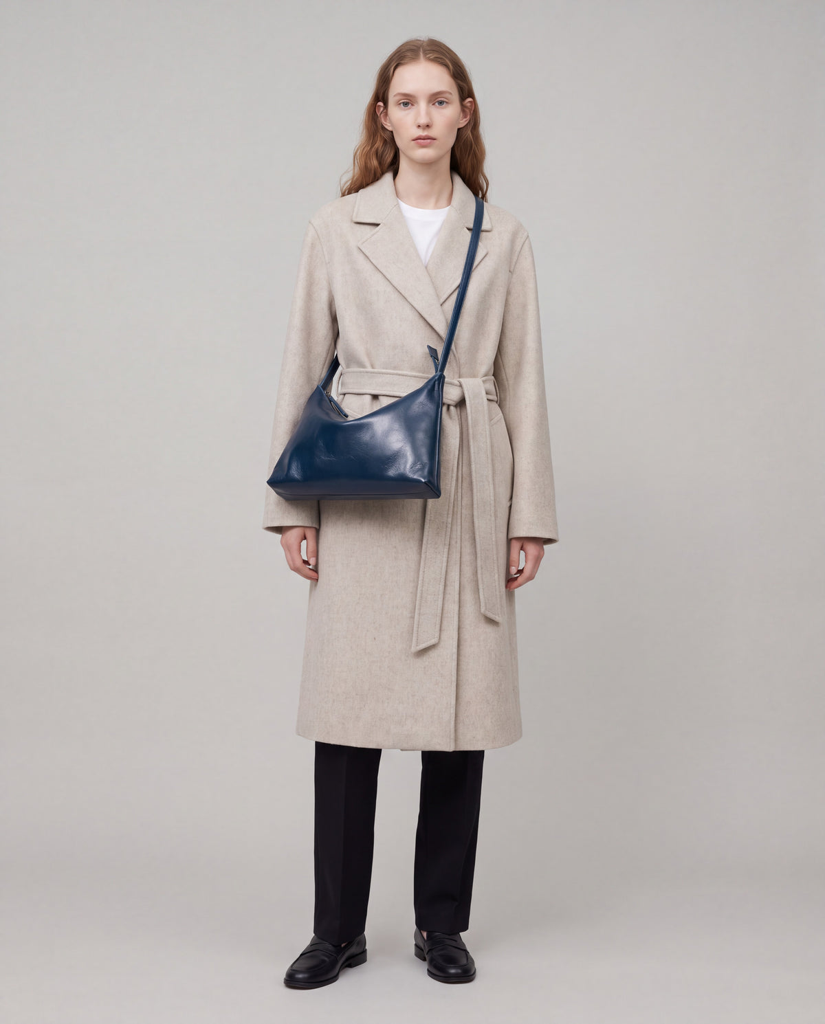 Lana bag in Navy – worn by model, full length