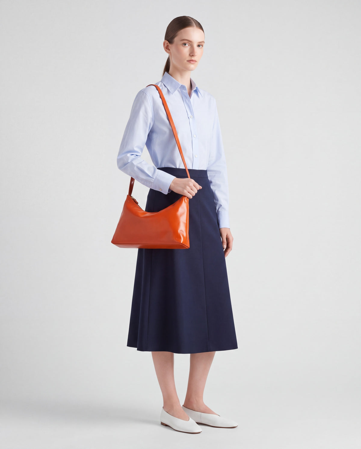 Lana bag in Orange – worn by model, full length