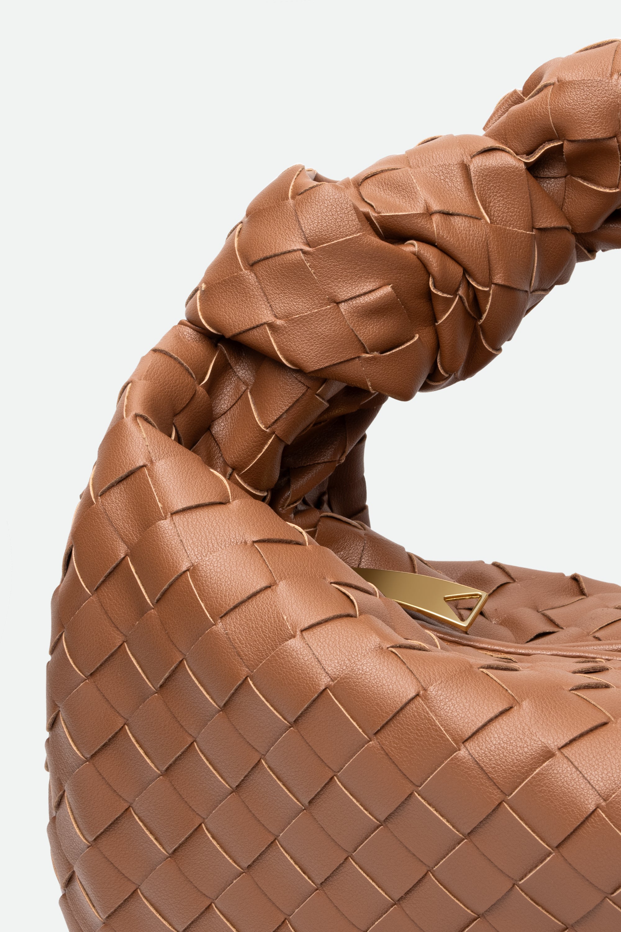 Close-up of Large Knot Bag (Jodie) brown woven handbag with a knotted handle and gold hardware