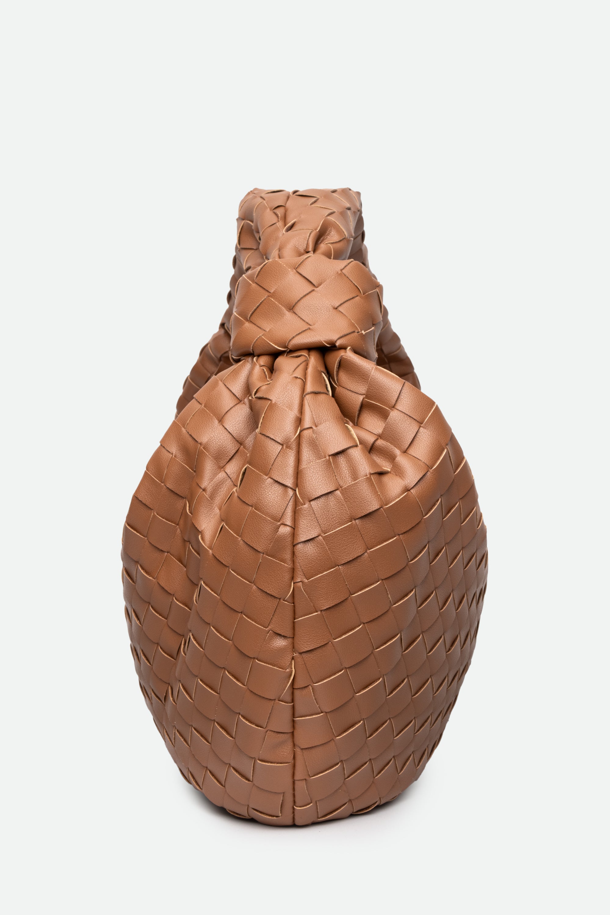 Large Knot Bag (Jodie) brown woven handbag standing upright with a knotted top