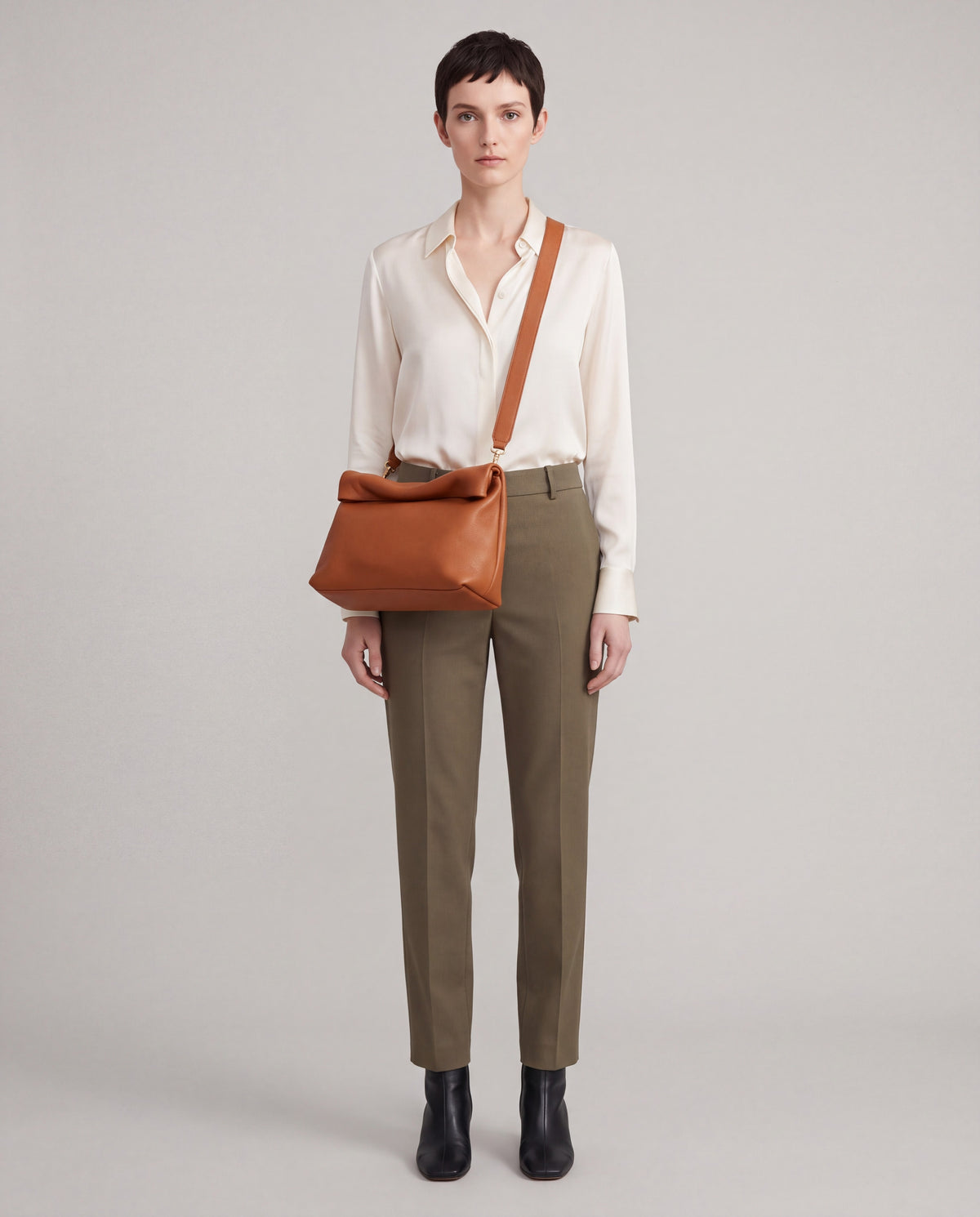 Lido bag in Caramel – worn by model, full length
