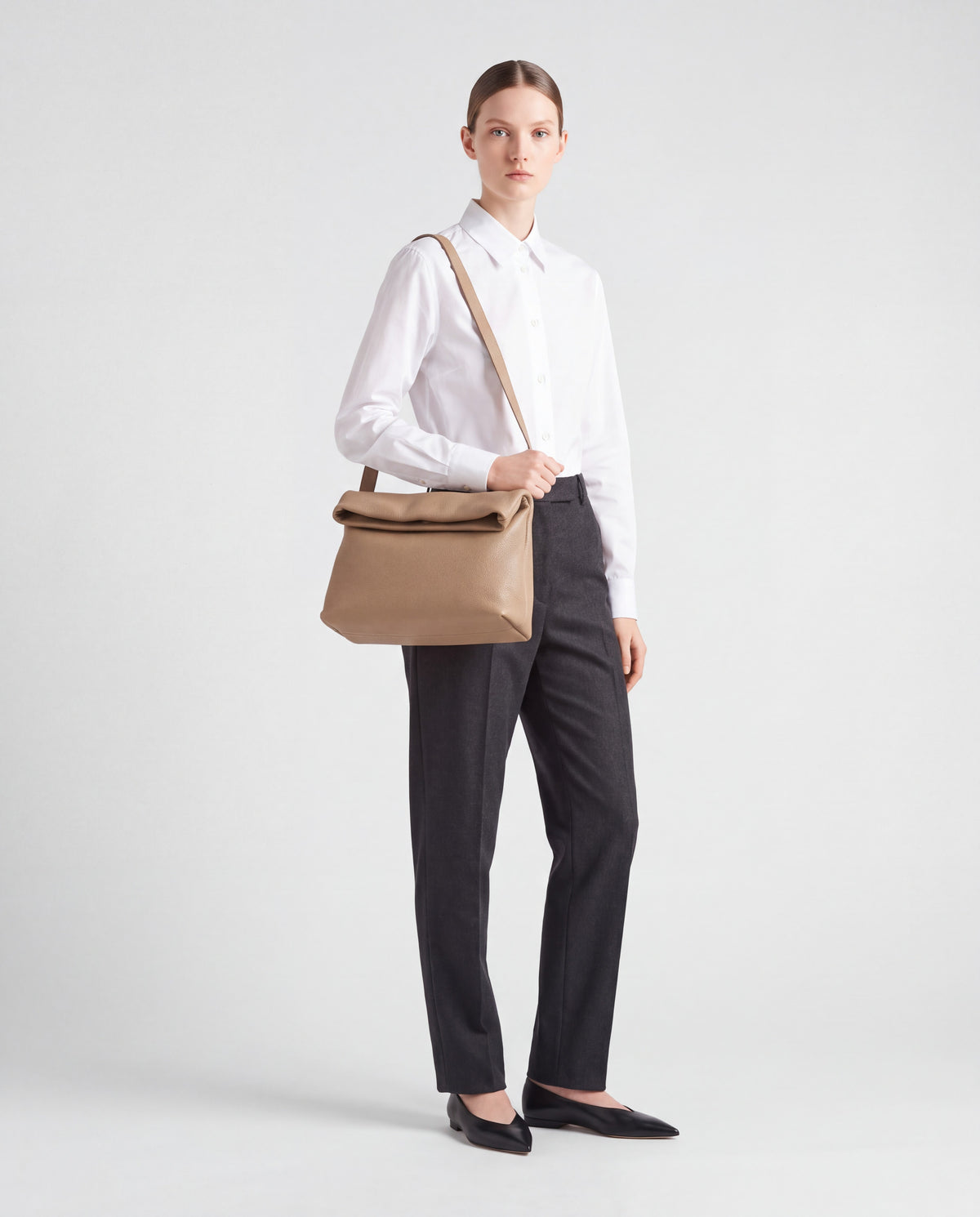 Lido bag in Taupe – worn by model, full length