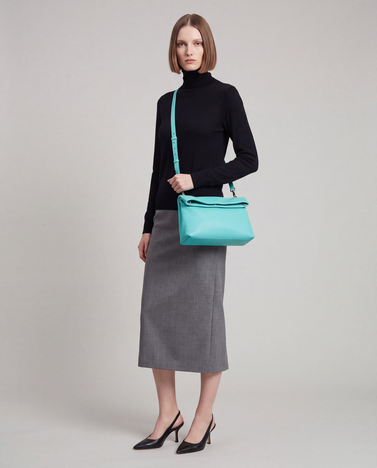 Lido bag in Turquoise – worn by model, full length