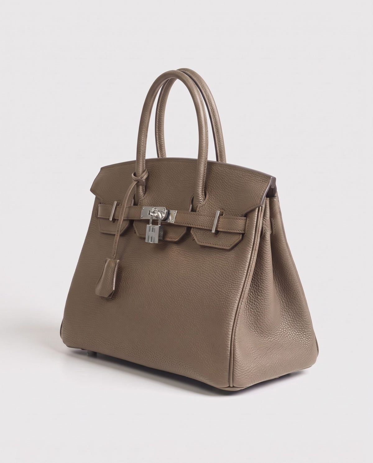 Lock Large leather top-handle bag in Taupe – three-quarter view