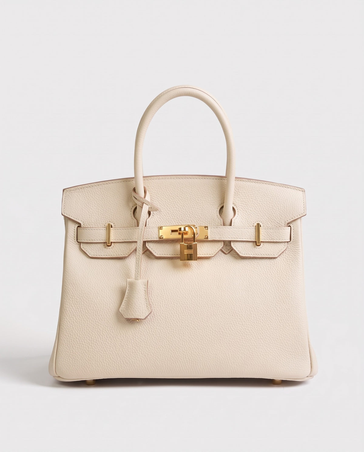 Lock Medium leather top-handle bag in Cream – front view