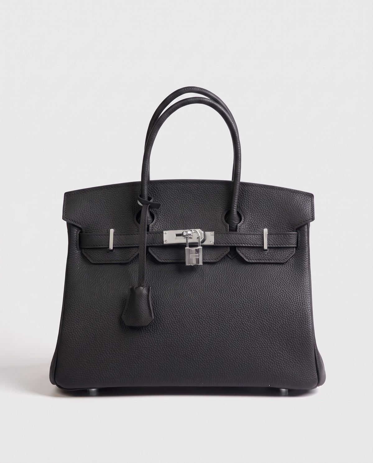 Lock Medium leather top-handle bag in Onyx – front view