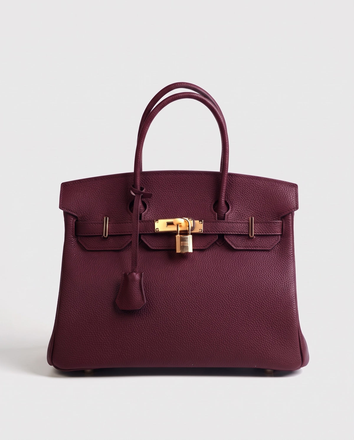Lock Small leather top-handle bag in Bordeaux – front view