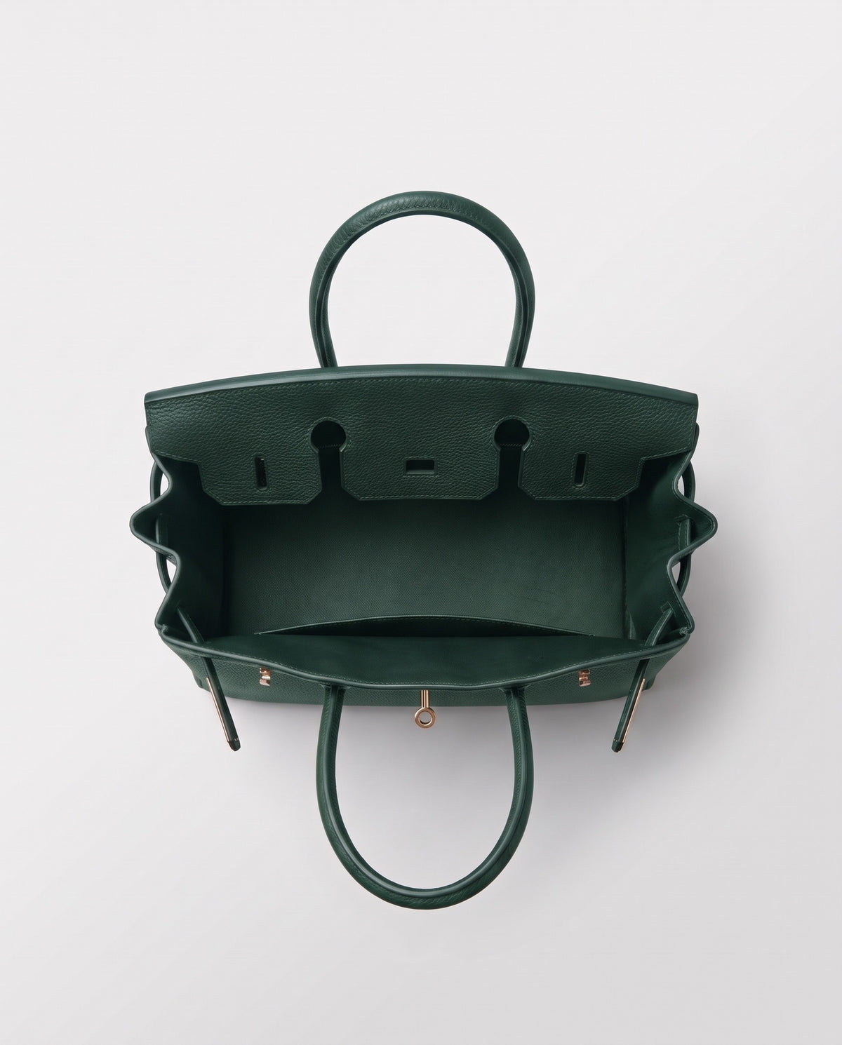 Lock Small leather top-handle bag in Emerald – inside view showing the leather lining