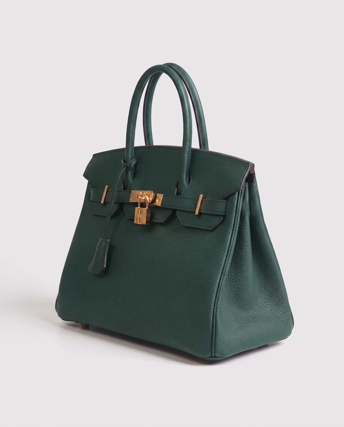 Lock Small leather top-handle bag in Emerald – three-quarter view
