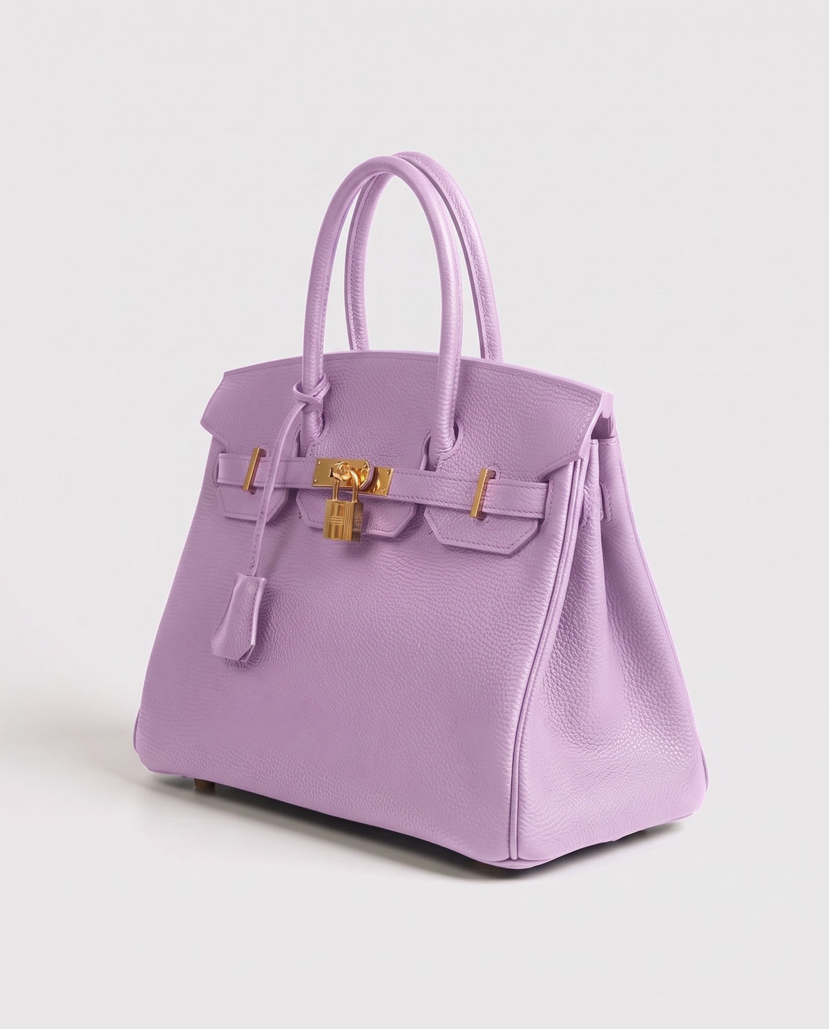 Lock Small leather top-handle bag in Lilac – three-quarter view