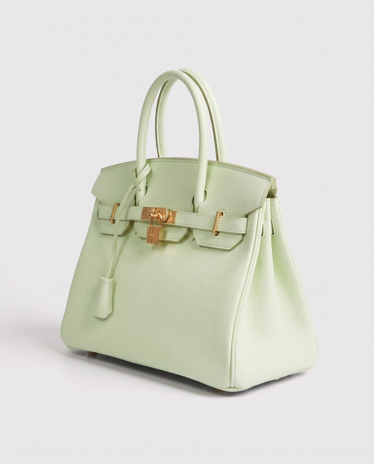 Lock Small leather top-handle bag in Mint – three-quarter view