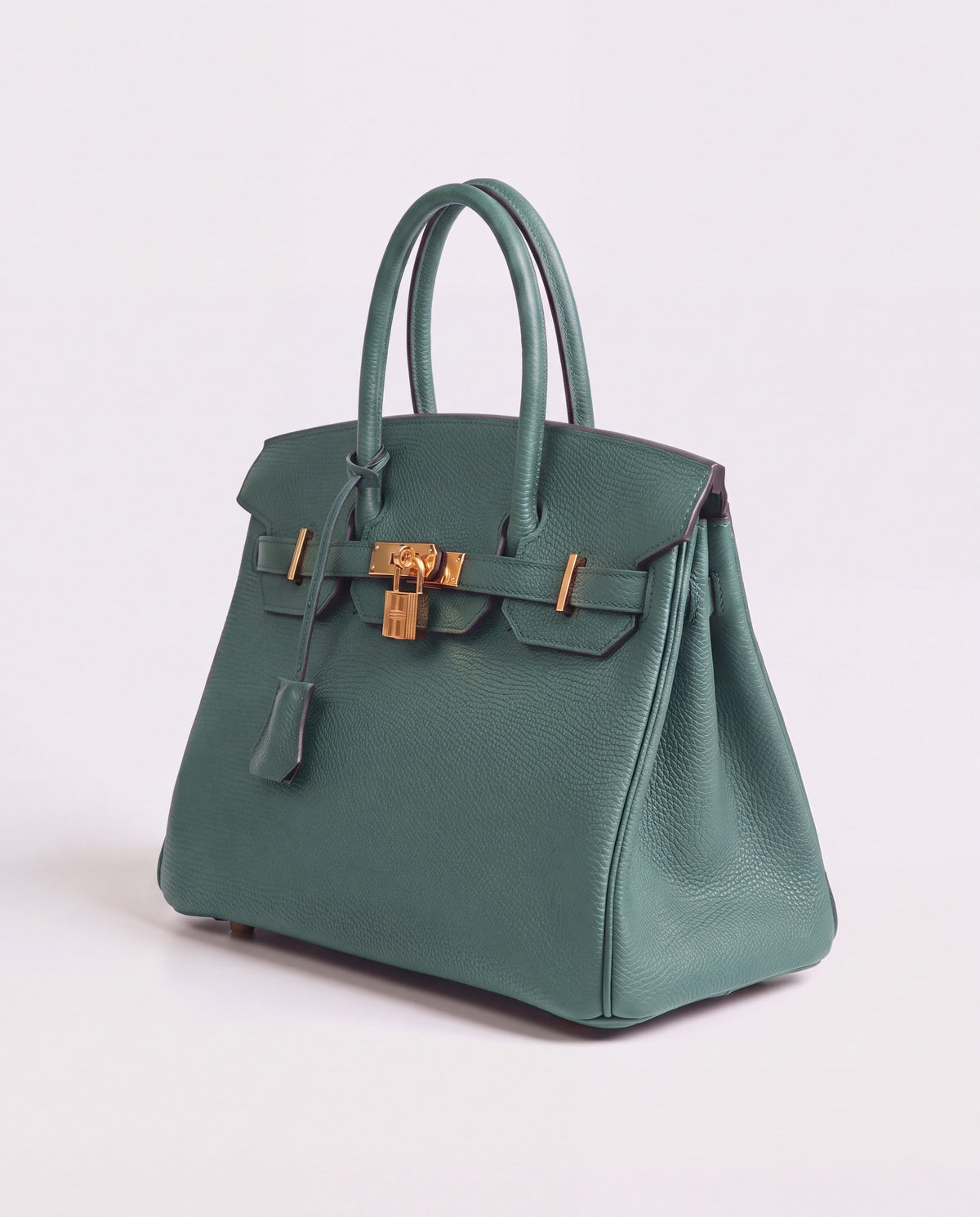 Lock Small leather top-handle bag in Velvet Green – three-quarter view