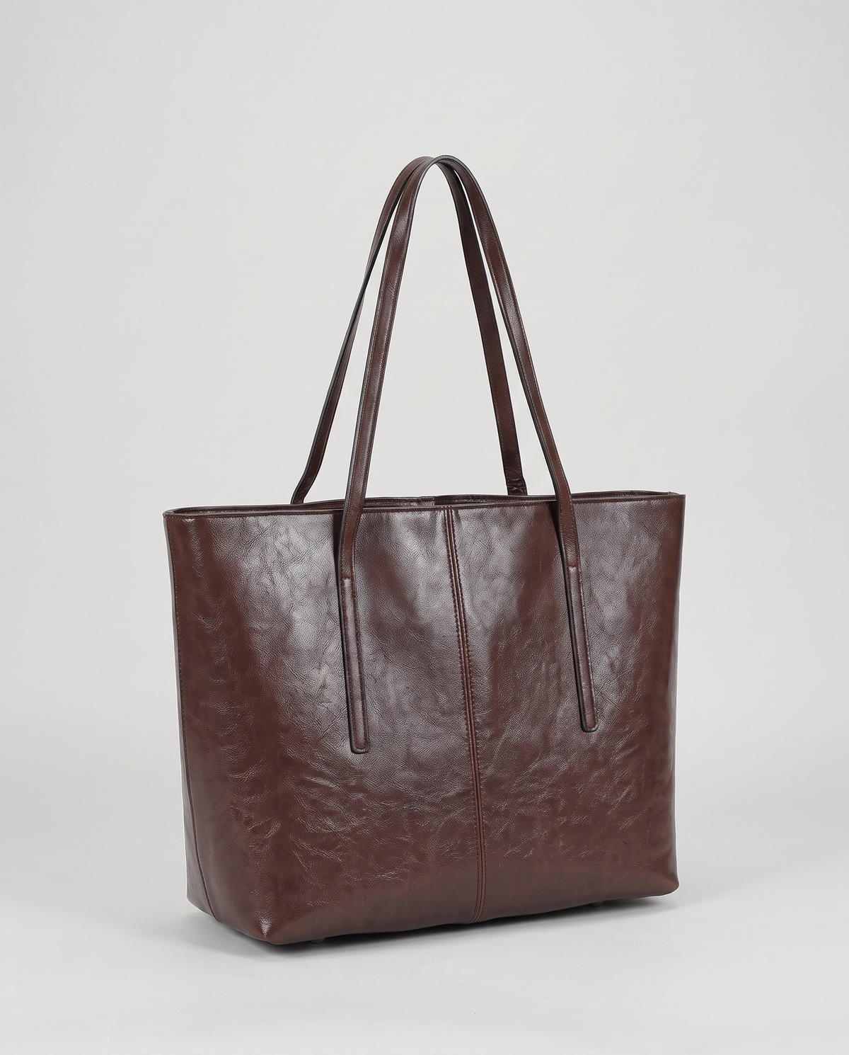 Molo oil-waxed leather tote in chocolate, three-quarter view