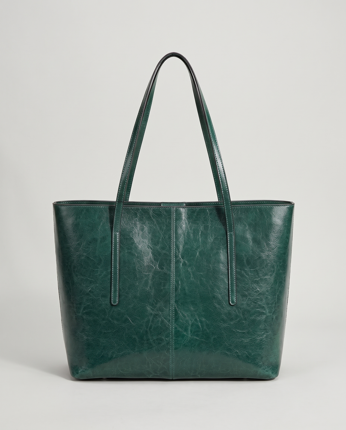 Molo oil-waxed leather tote in emerald, front view