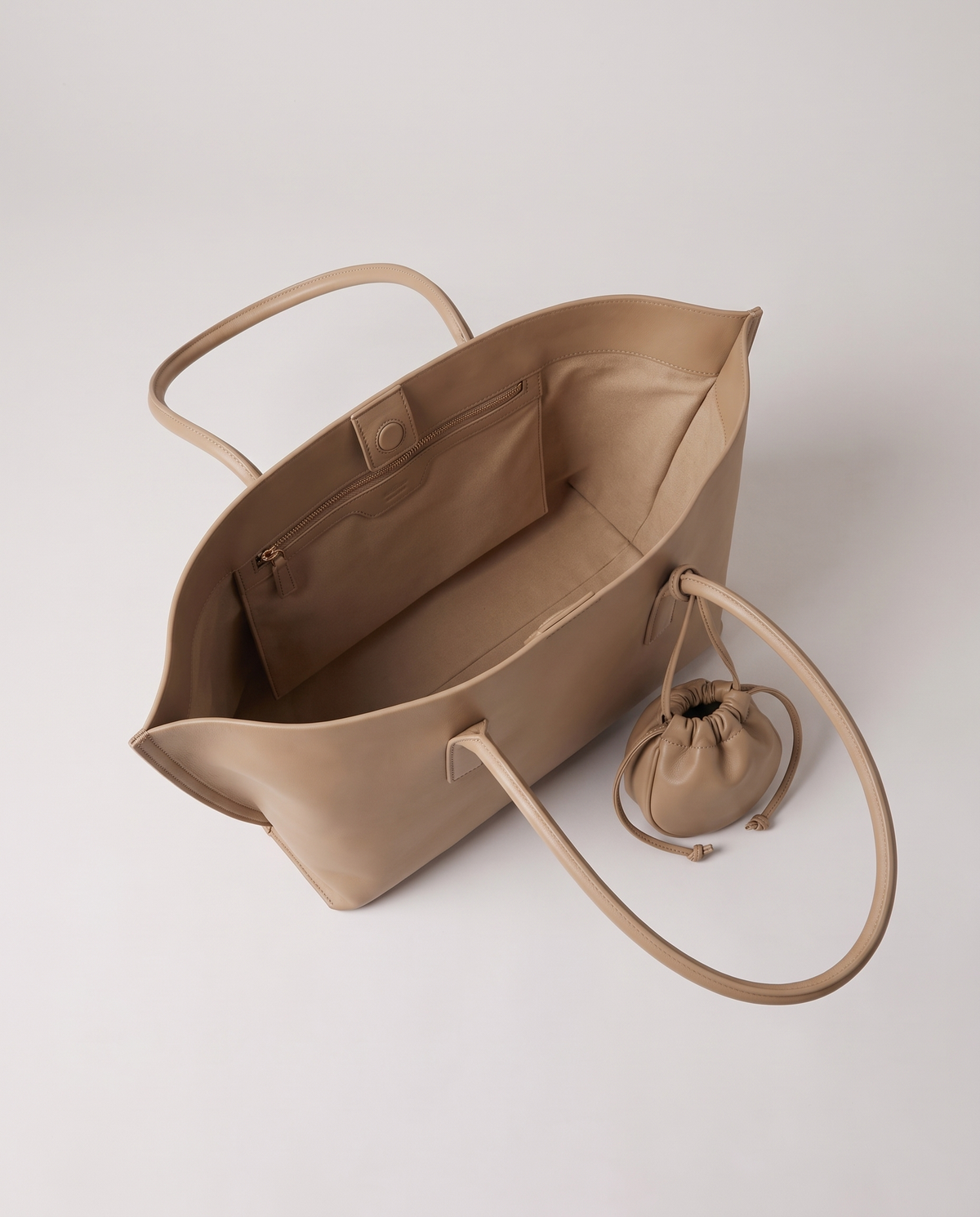 Noce tote in beige, open showing interior