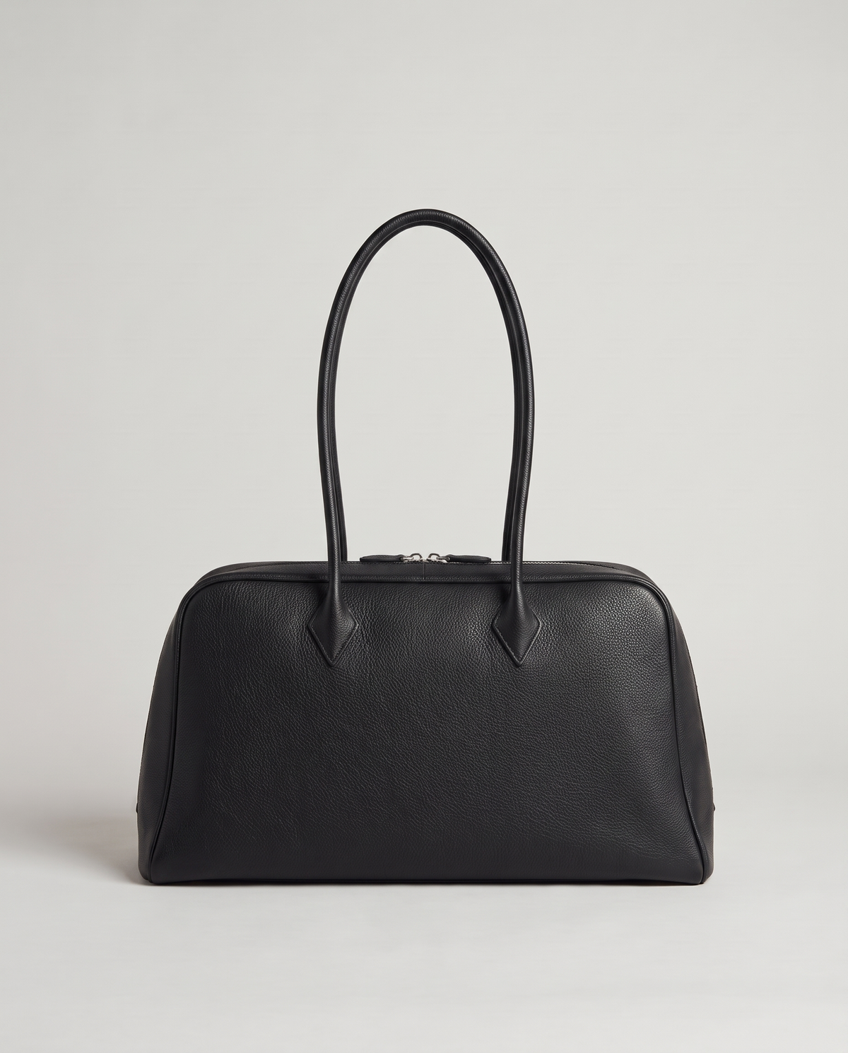 Ora Small leather shoulder bag in Black – back view