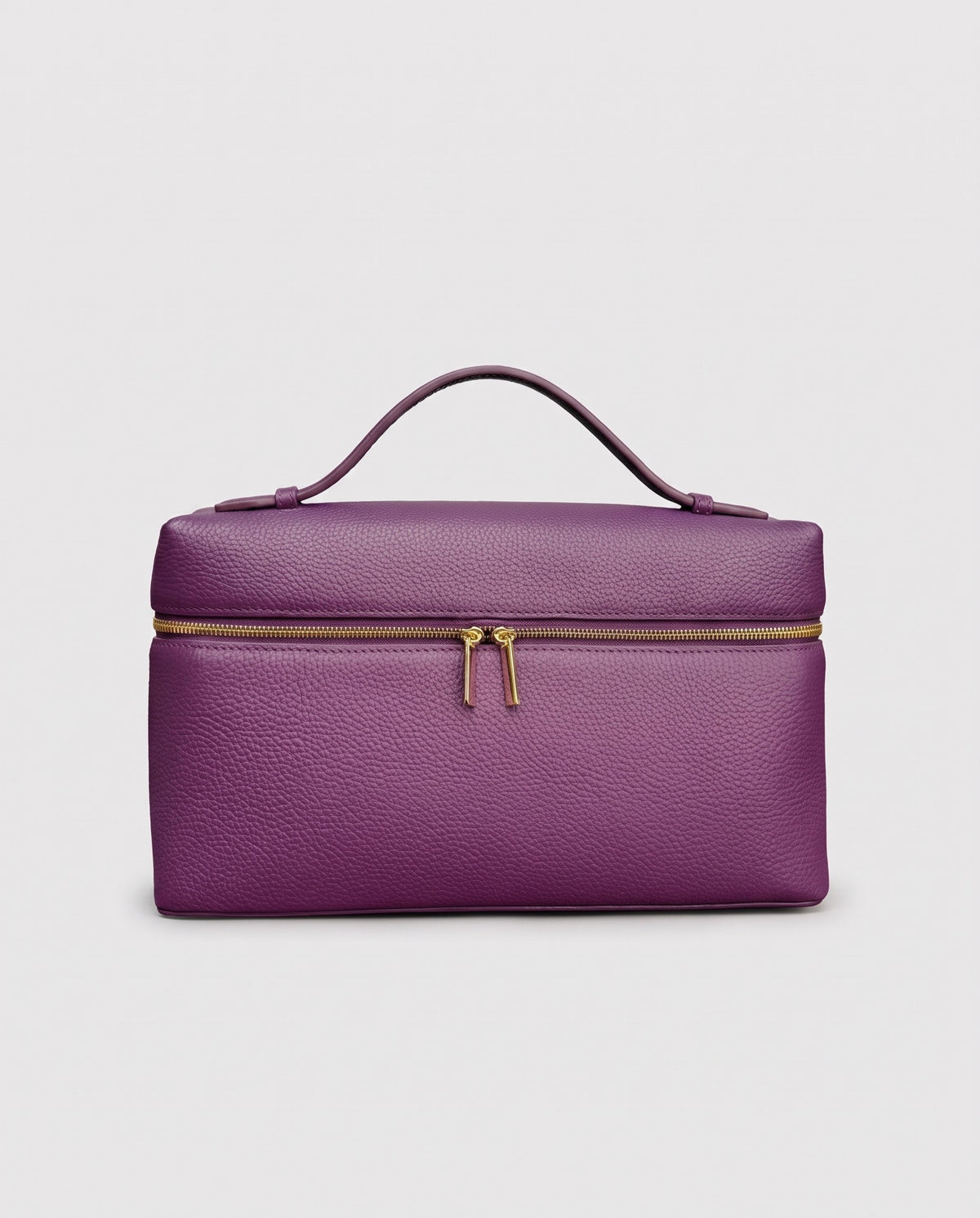 Orvieto pebbled leather vanity case in Purple – front view
