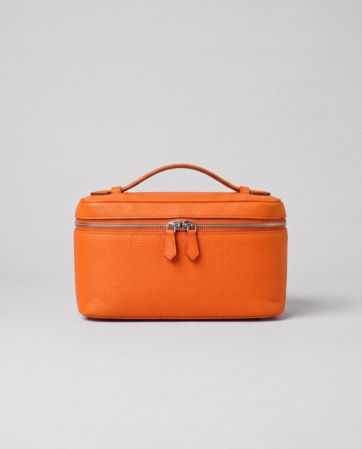 Orvieto pebbled leather vanity case in Orange – front view