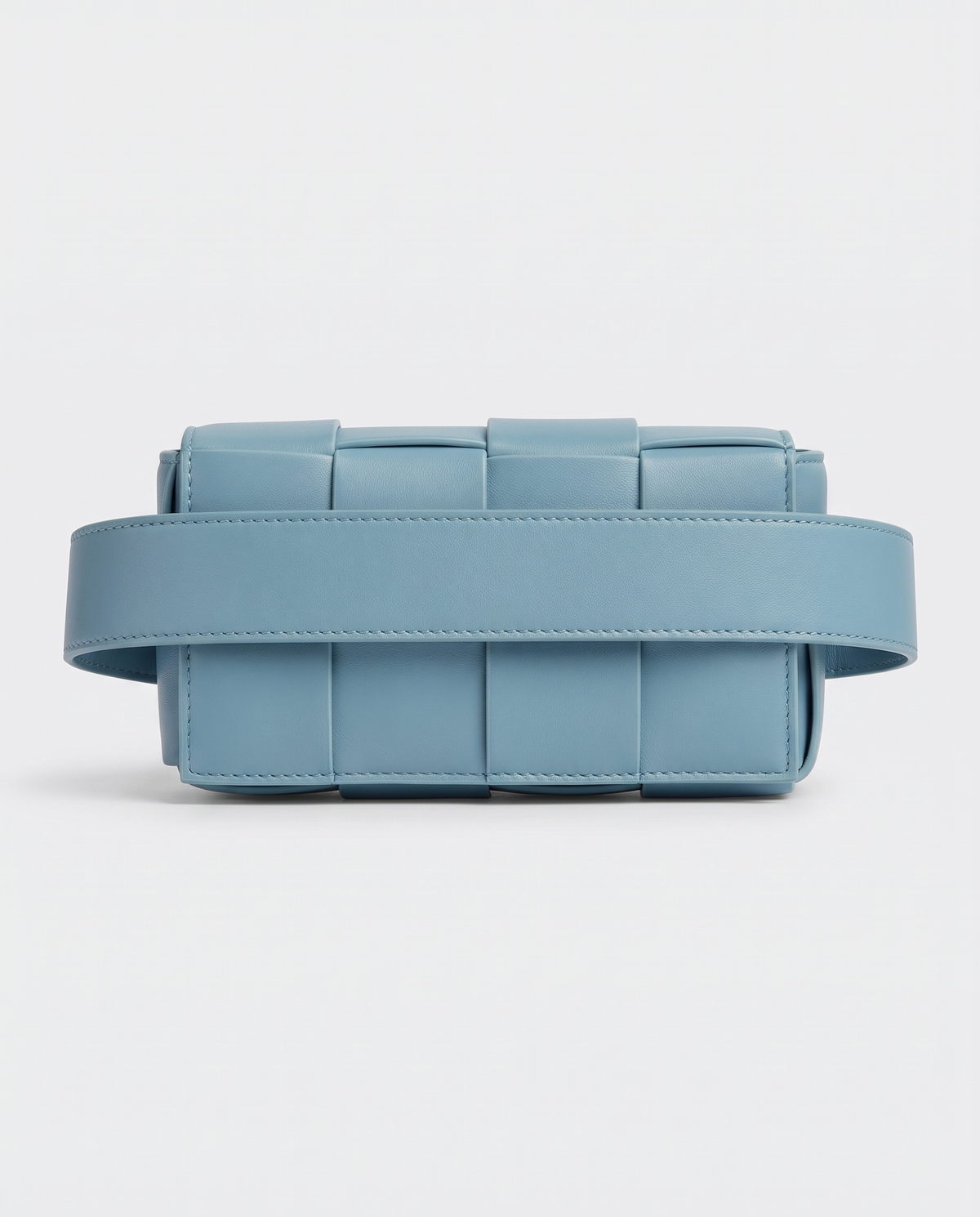 Cassette padded woven leather belt bag in Blue – back view showing the belt strap