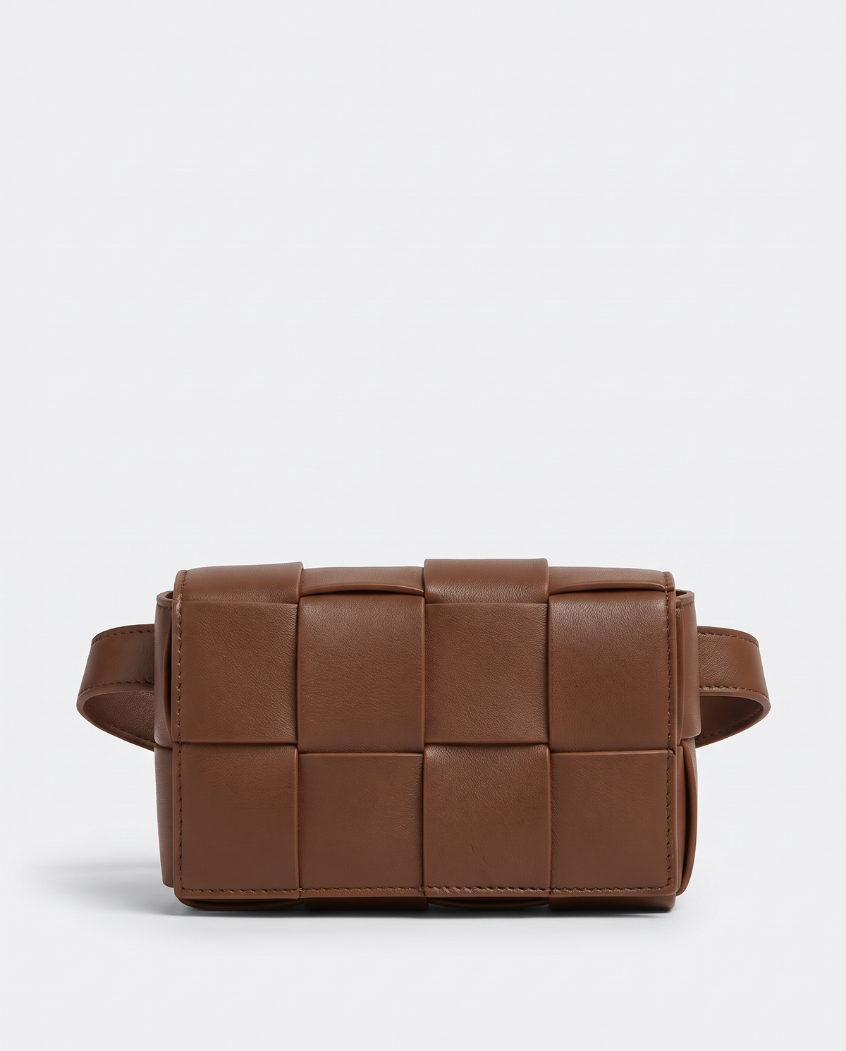 Cassette padded woven leather belt bag in Brown – front view