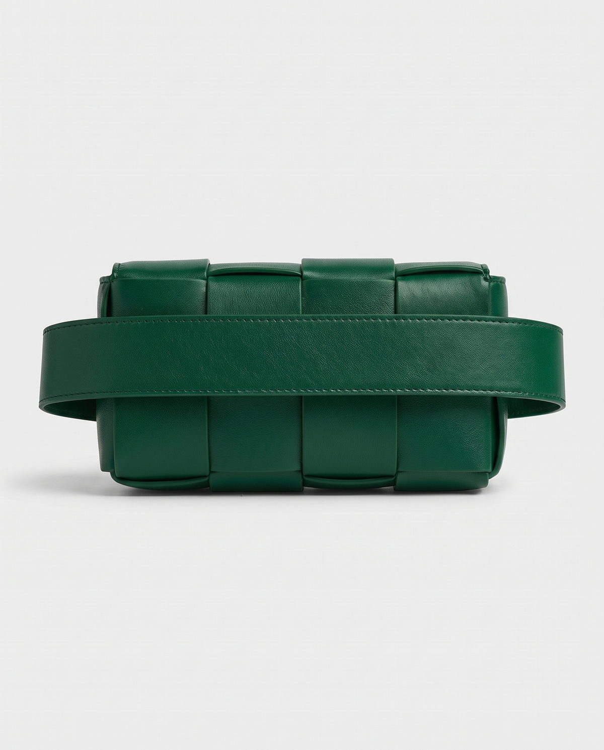Cassette padded woven leather belt bag in Green – back view showing the belt strap