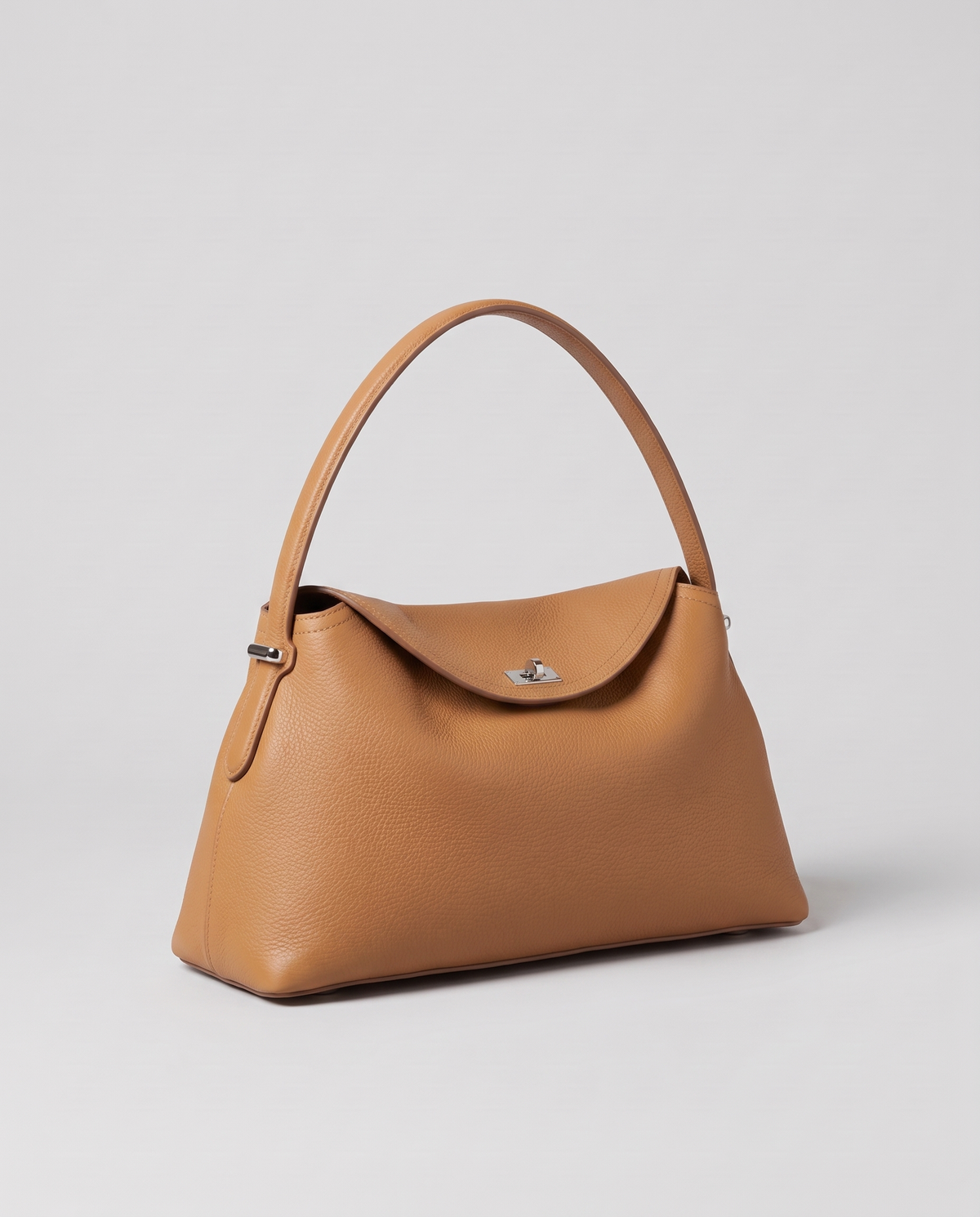 Porto pebbled leather top-handle bag in camel, three-quarter view