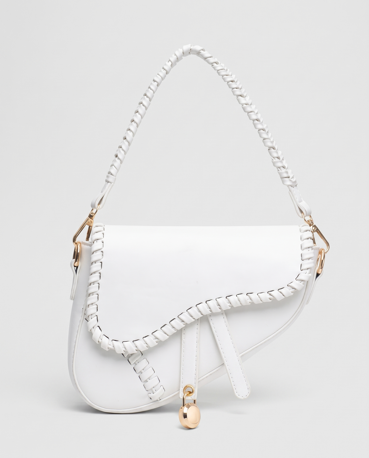 Saddle vegan leather shoulder bag in White – front view