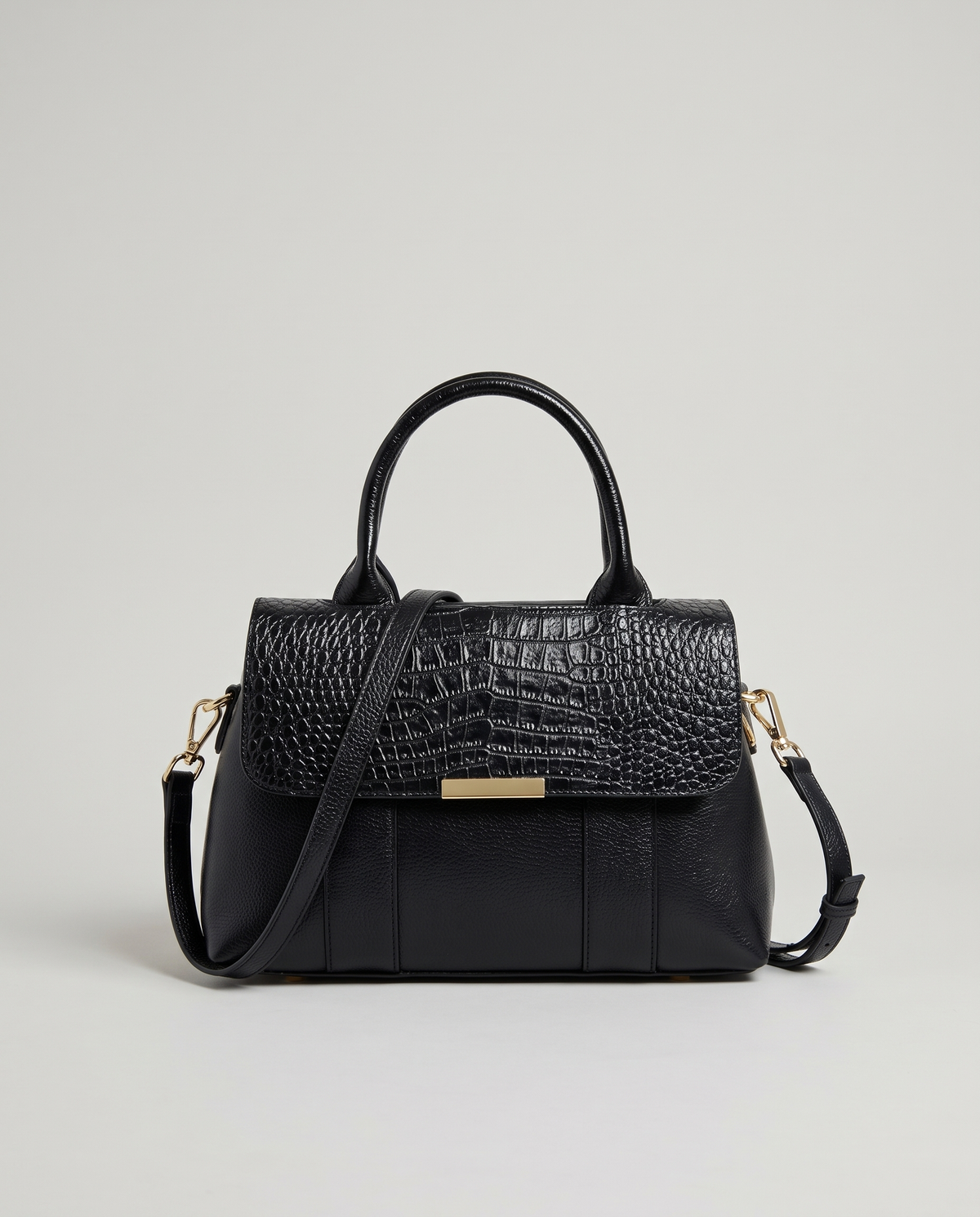 Sloane croc-embossed leather handbag in Black – front view