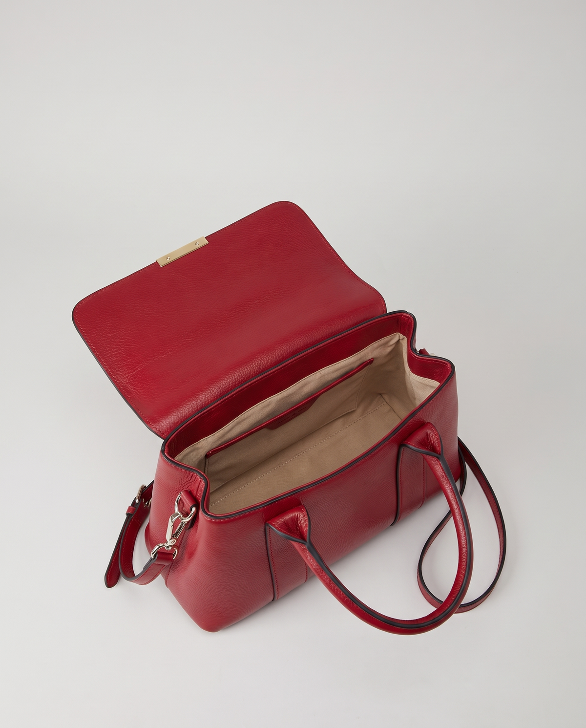 Sloane croc-embossed leather handbag in Red – flap open, showing the lined interior