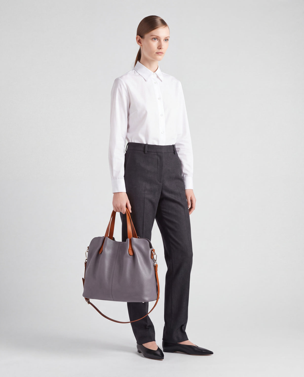 Soft Leather Tote Bag bag in Grey – worn by model, full length