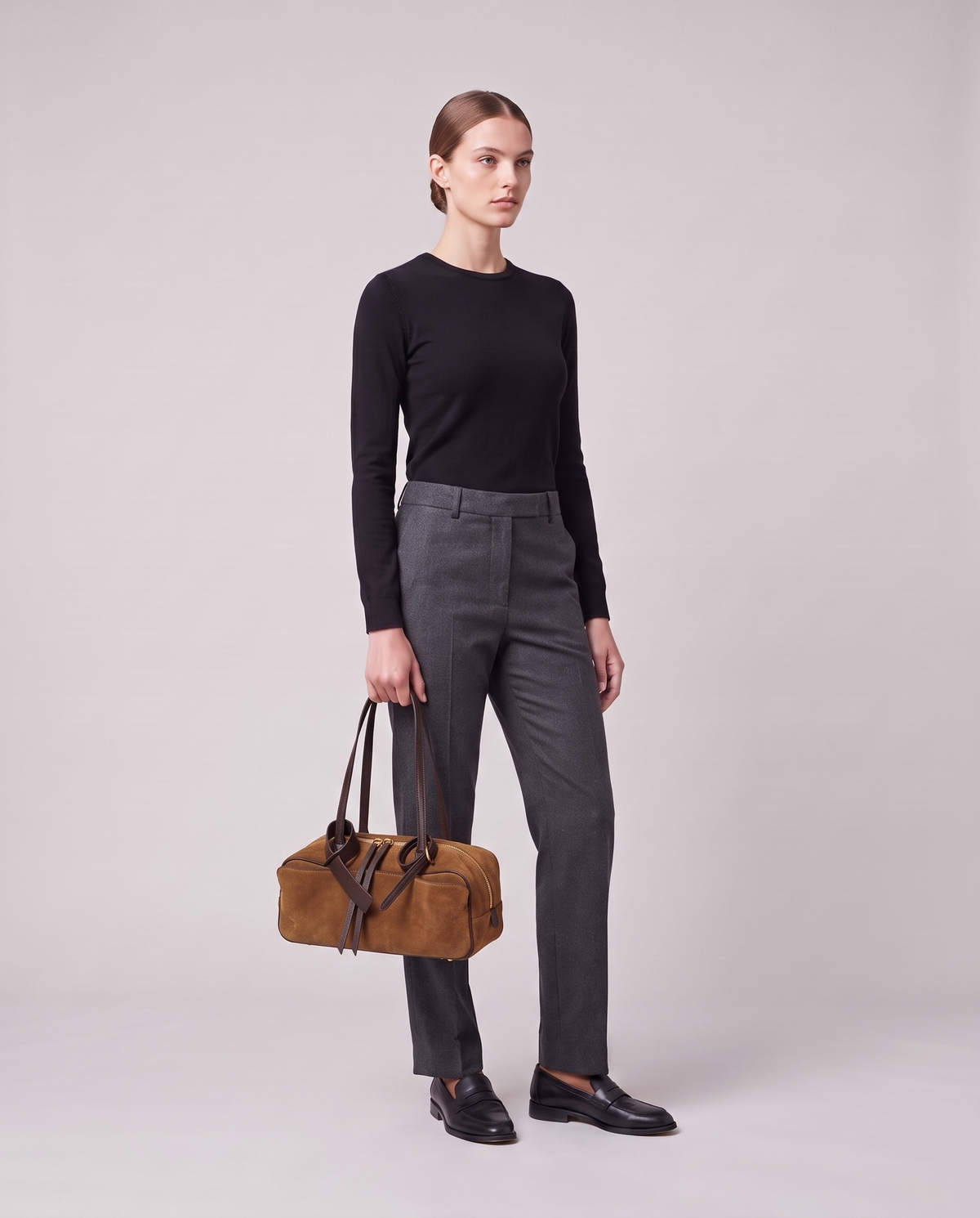 Model holding the Valentina Umbra Small bag in Camel, full length