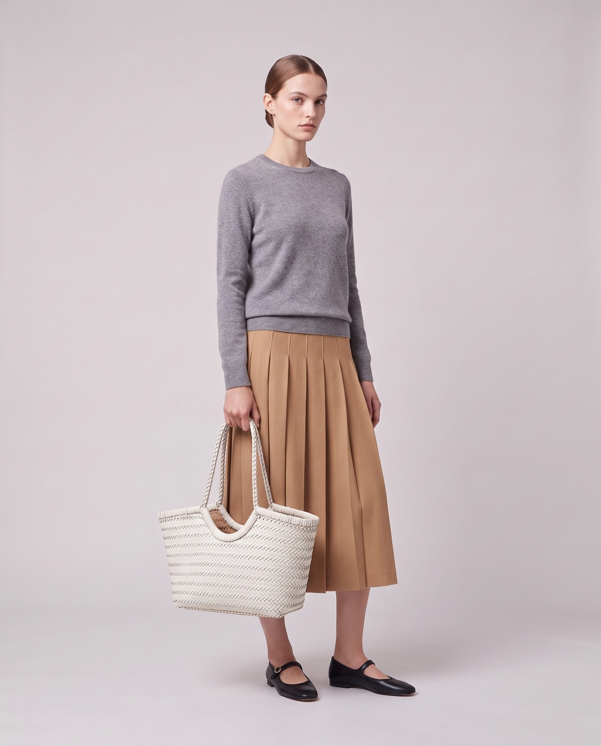 Model holding the Valentina Matera Small bag in White, full length