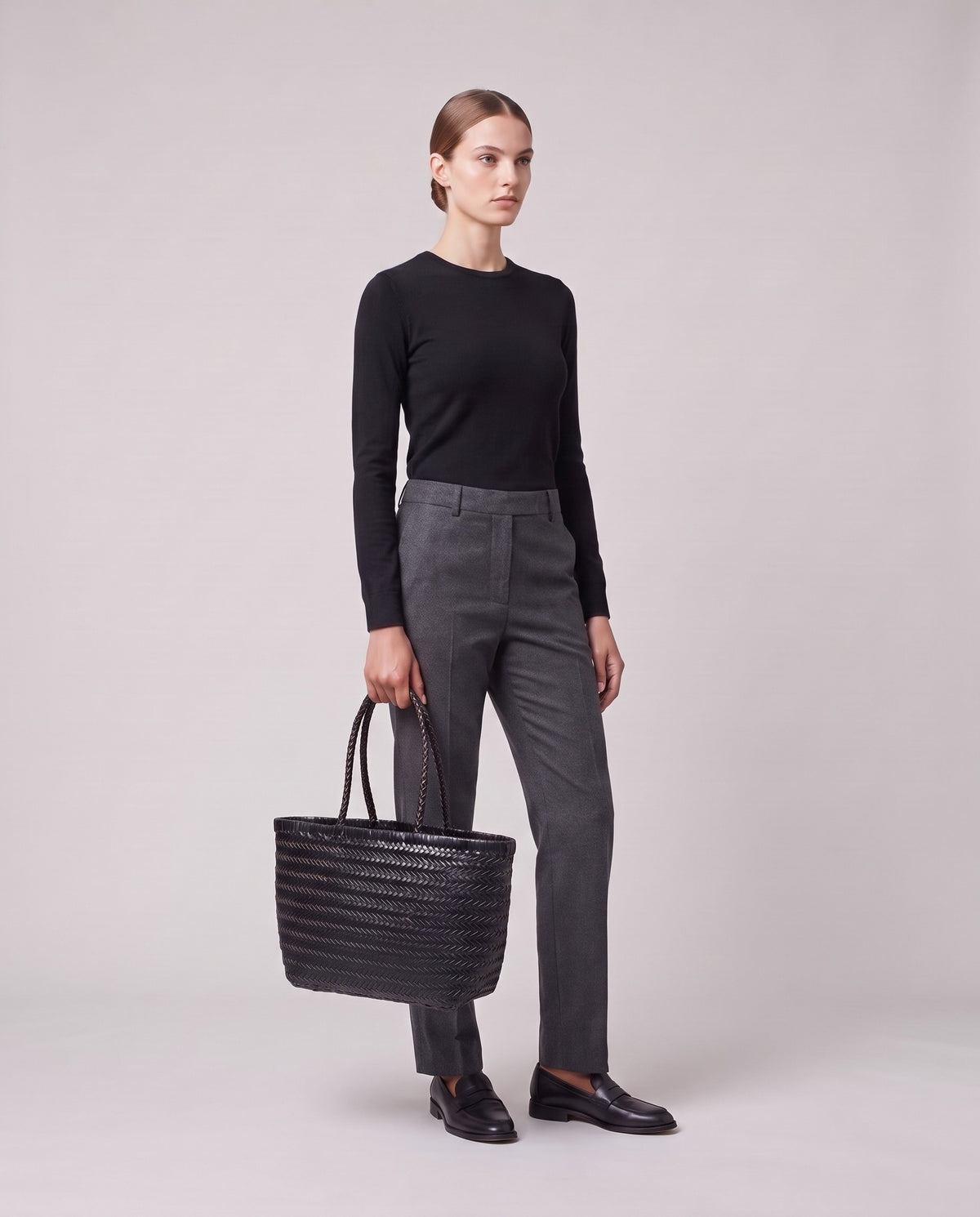 Model holding the Valentina Noto Small bag in Onyx, full length