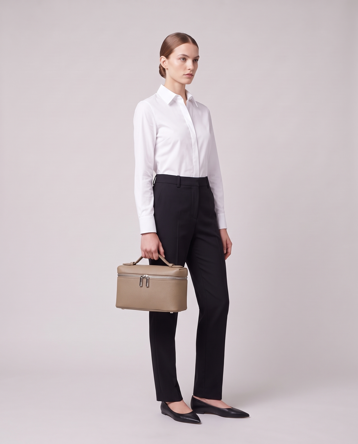 Model holding the Valentina Orvieto Small top-handle bag in Red leather, full length