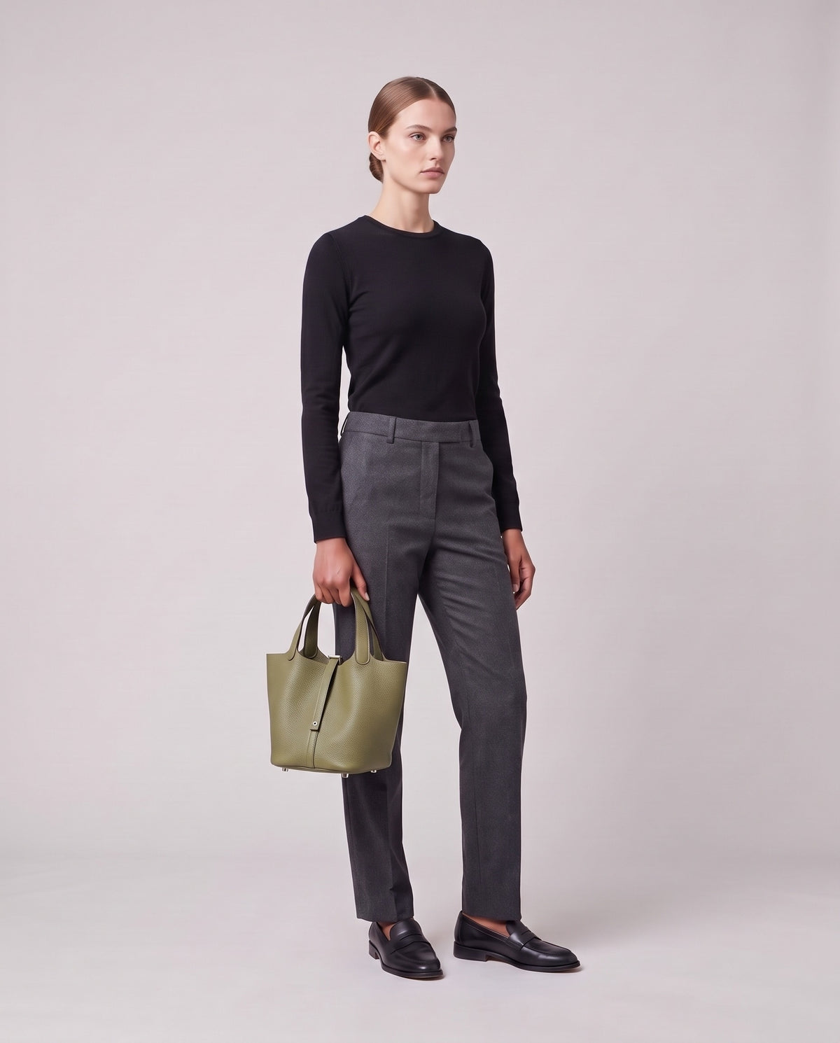 Model holding the Valentina Ostuni Small bag in Sage, full length