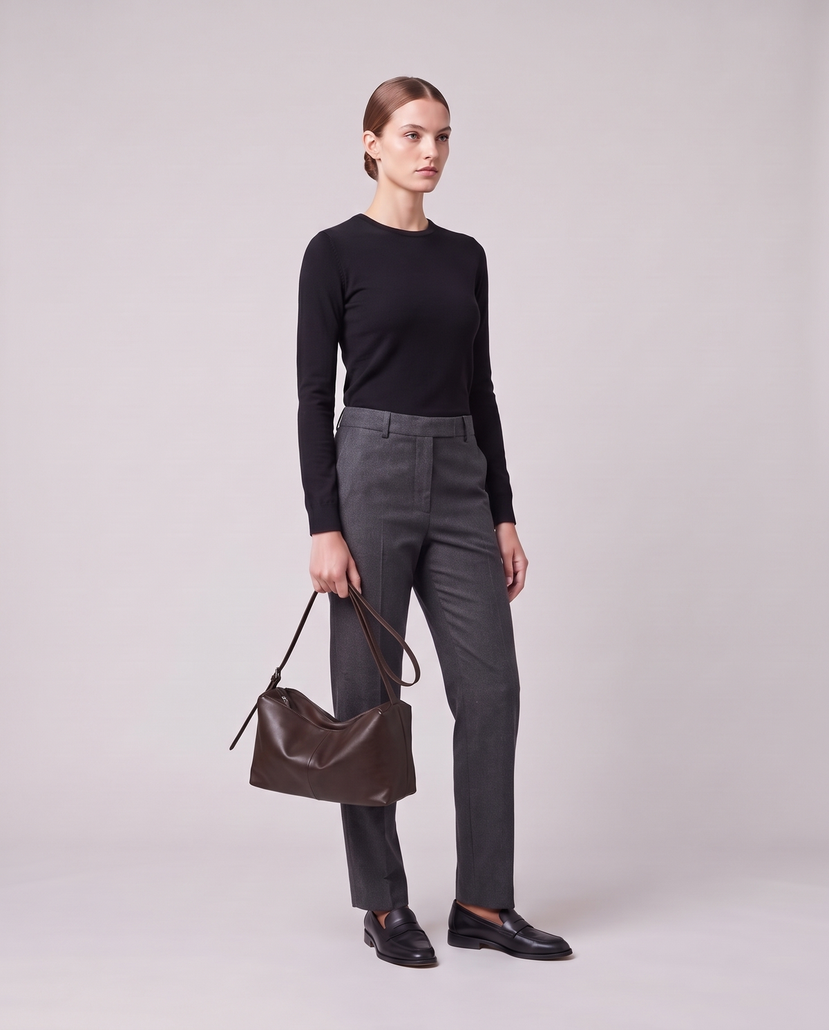 Model holding the Valentina Velluto Small bag in Chocolate, full length