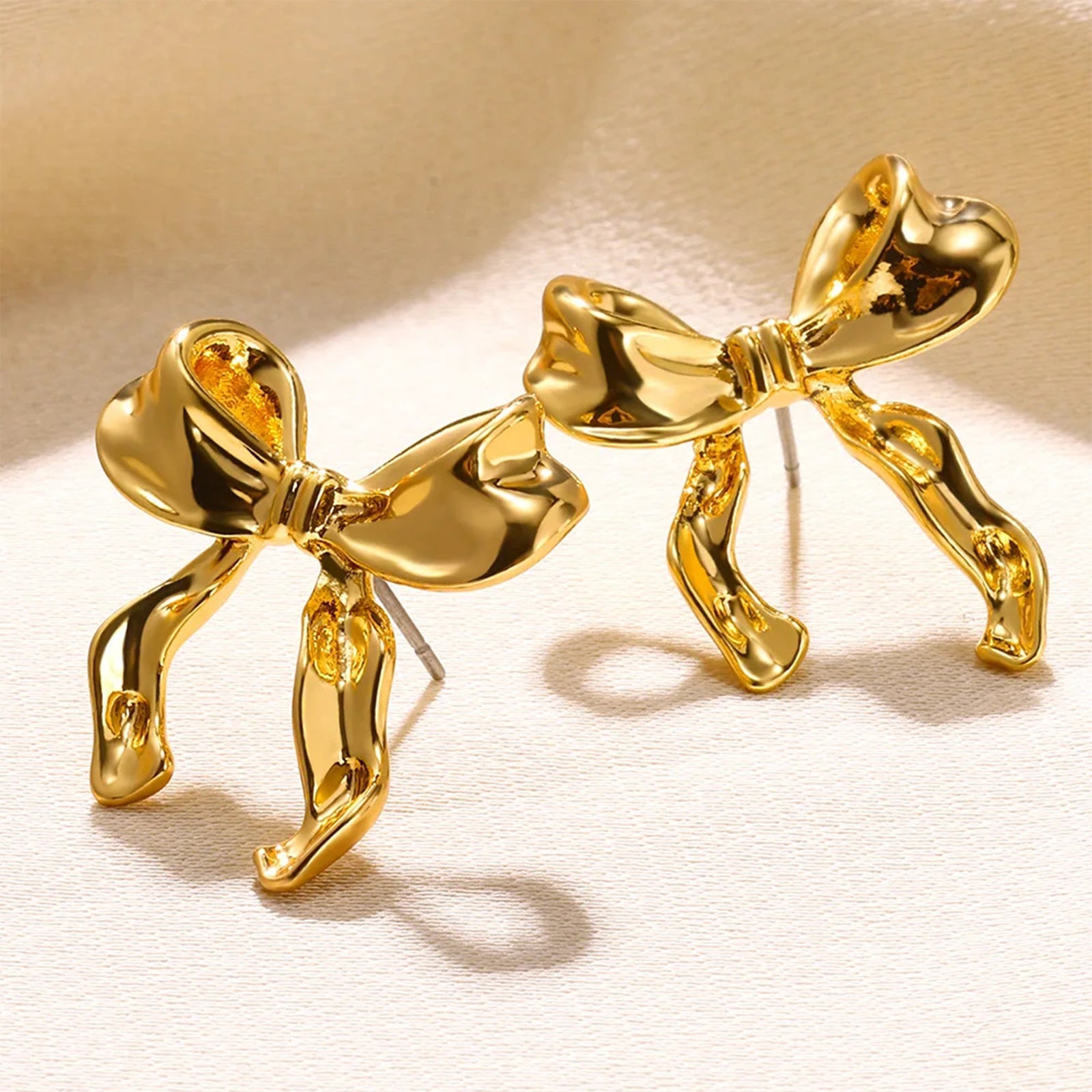Oversized Gold Bow Earrings Studs