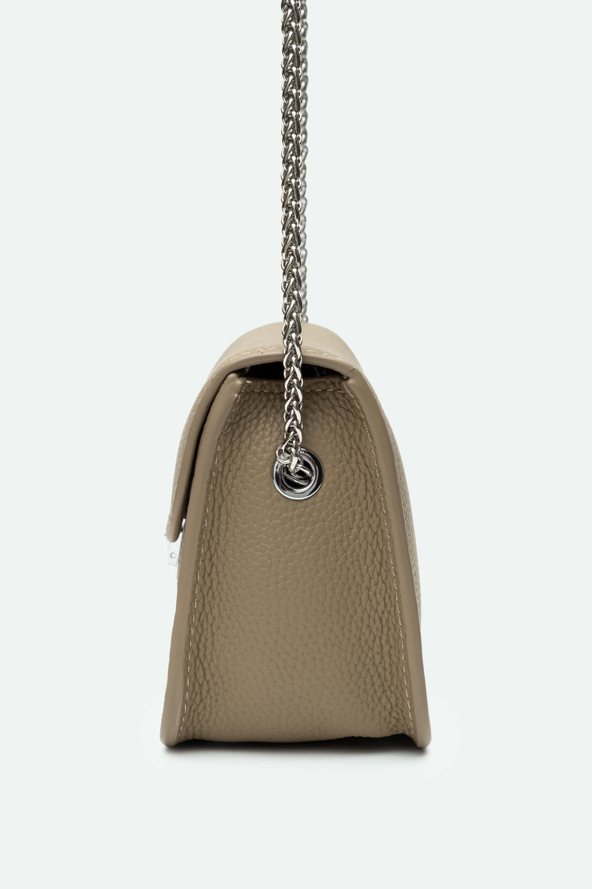Beige handbag with a chain strap on a white background