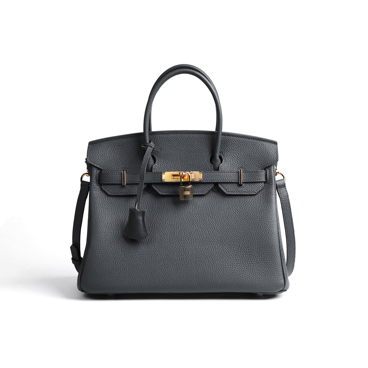 Black handbag with gold hardware on a white background