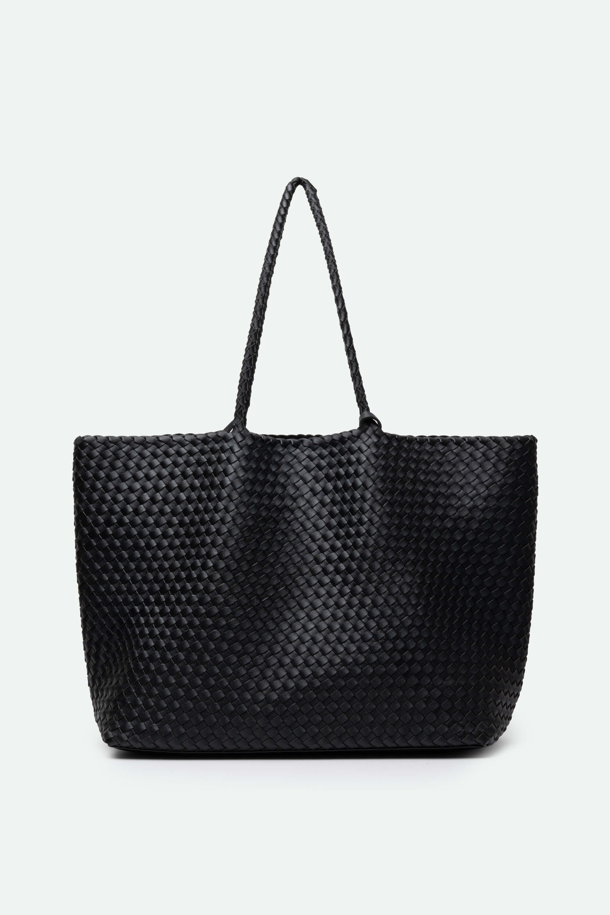 Black woven handbag on a white background