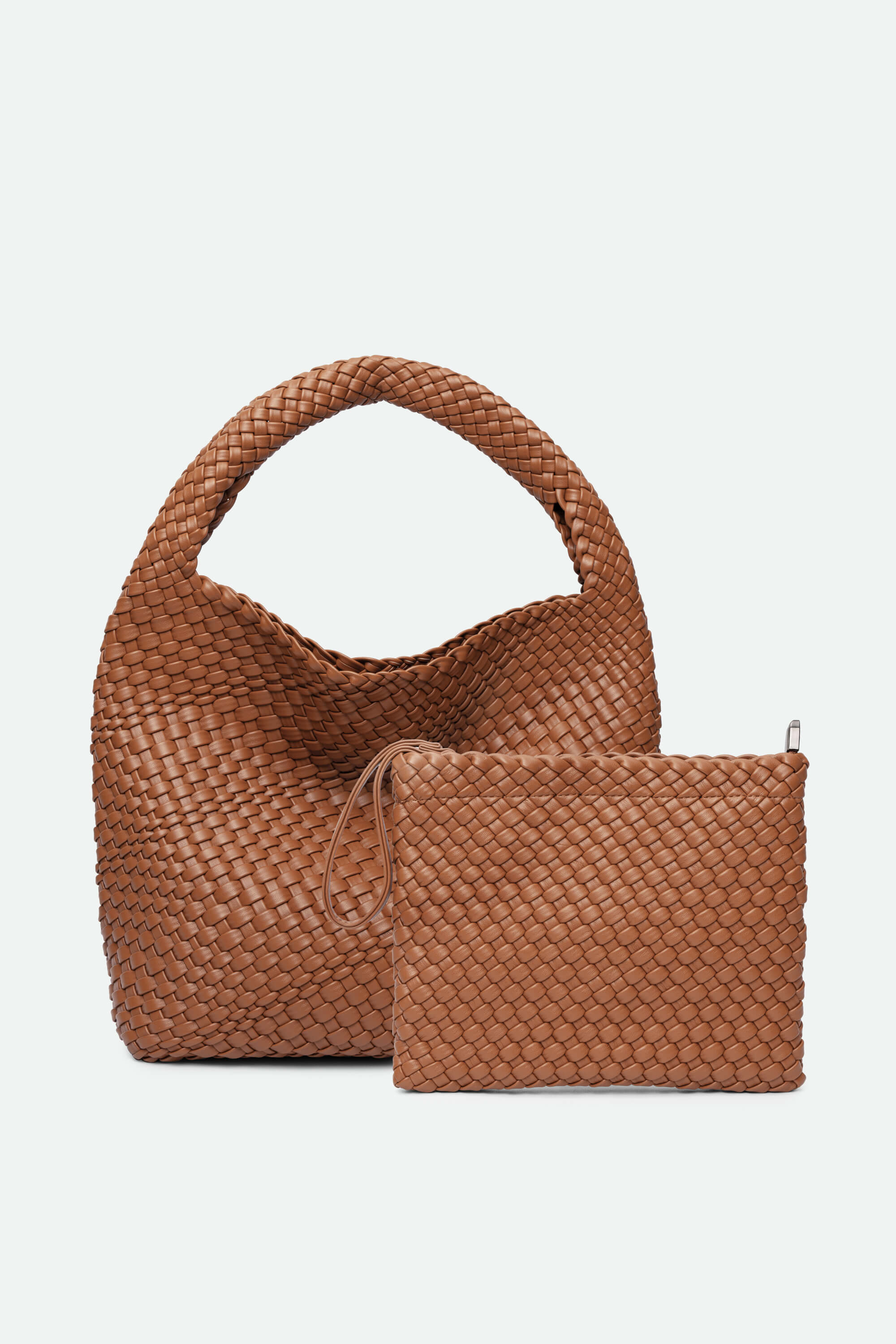Brown woven handbag and matching pouch on a light gray background