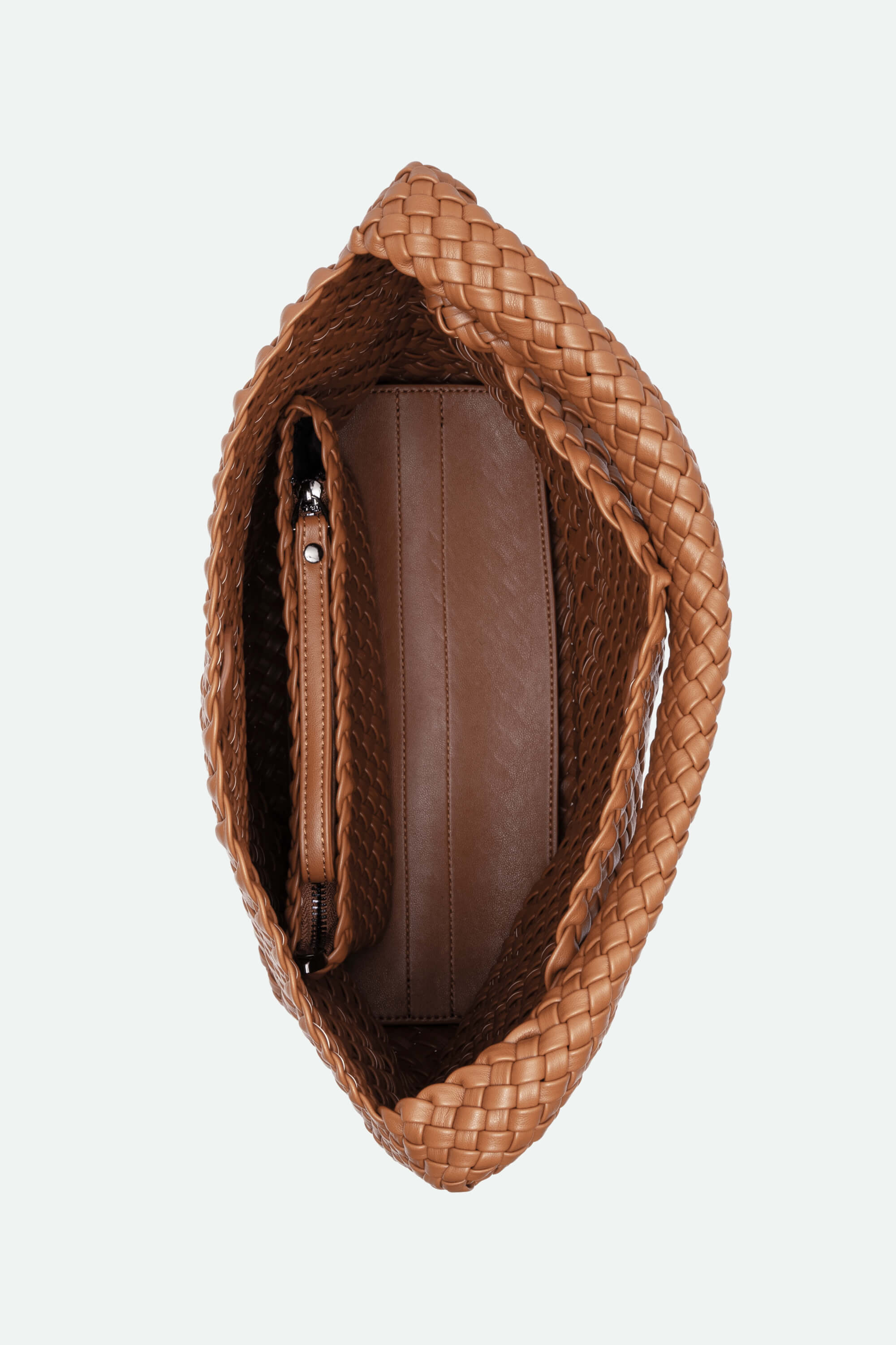 Brown woven handbag on a light gray background