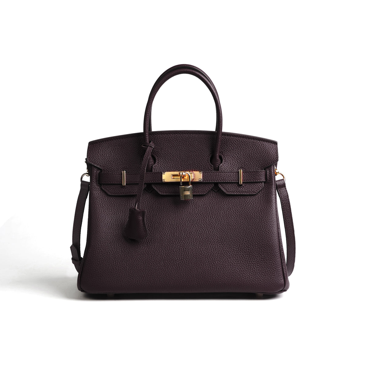 Dark purple handbag with gold hardware on a white background