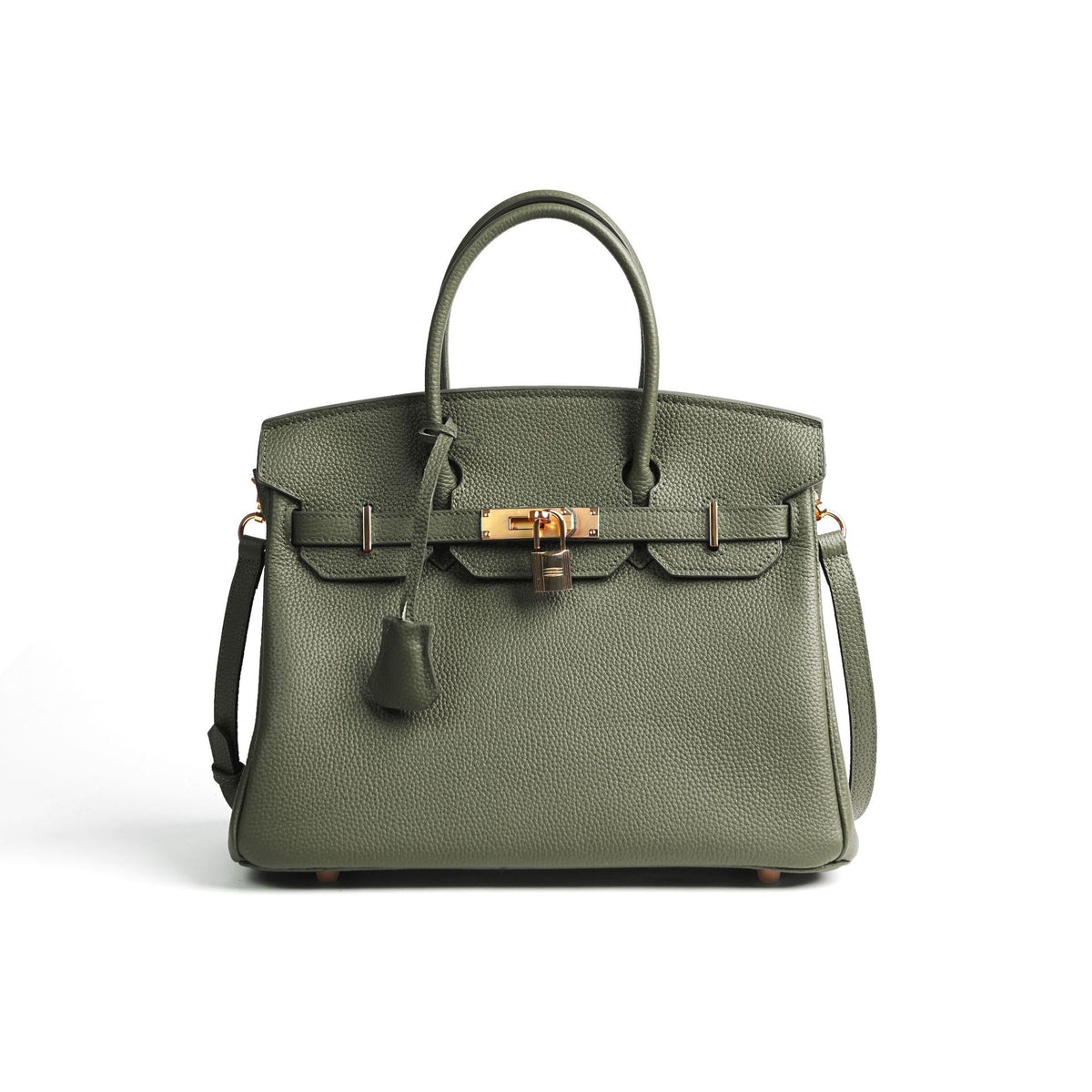 Green handbag with gold hardware on a white background