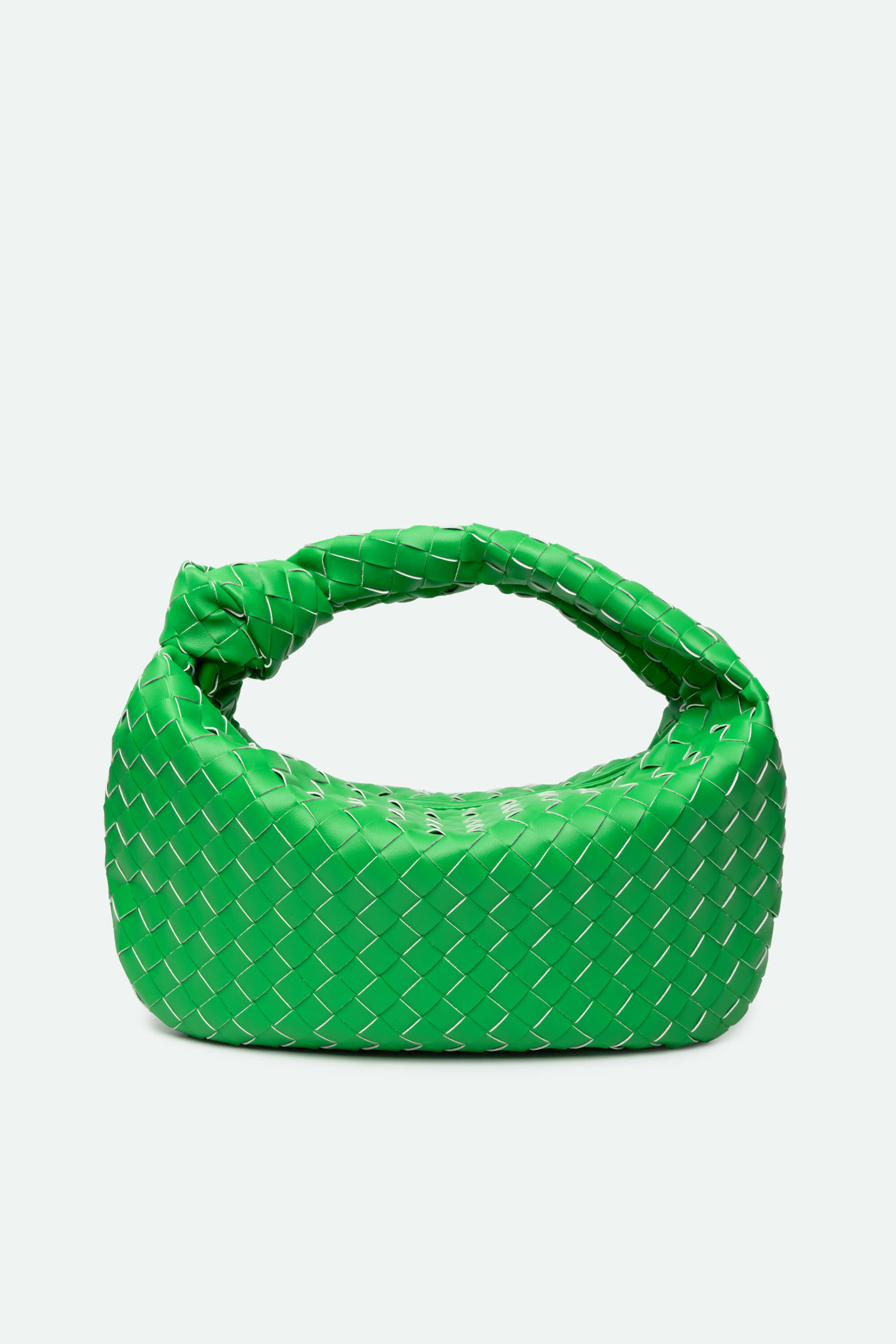 Green patterned bag on a white background