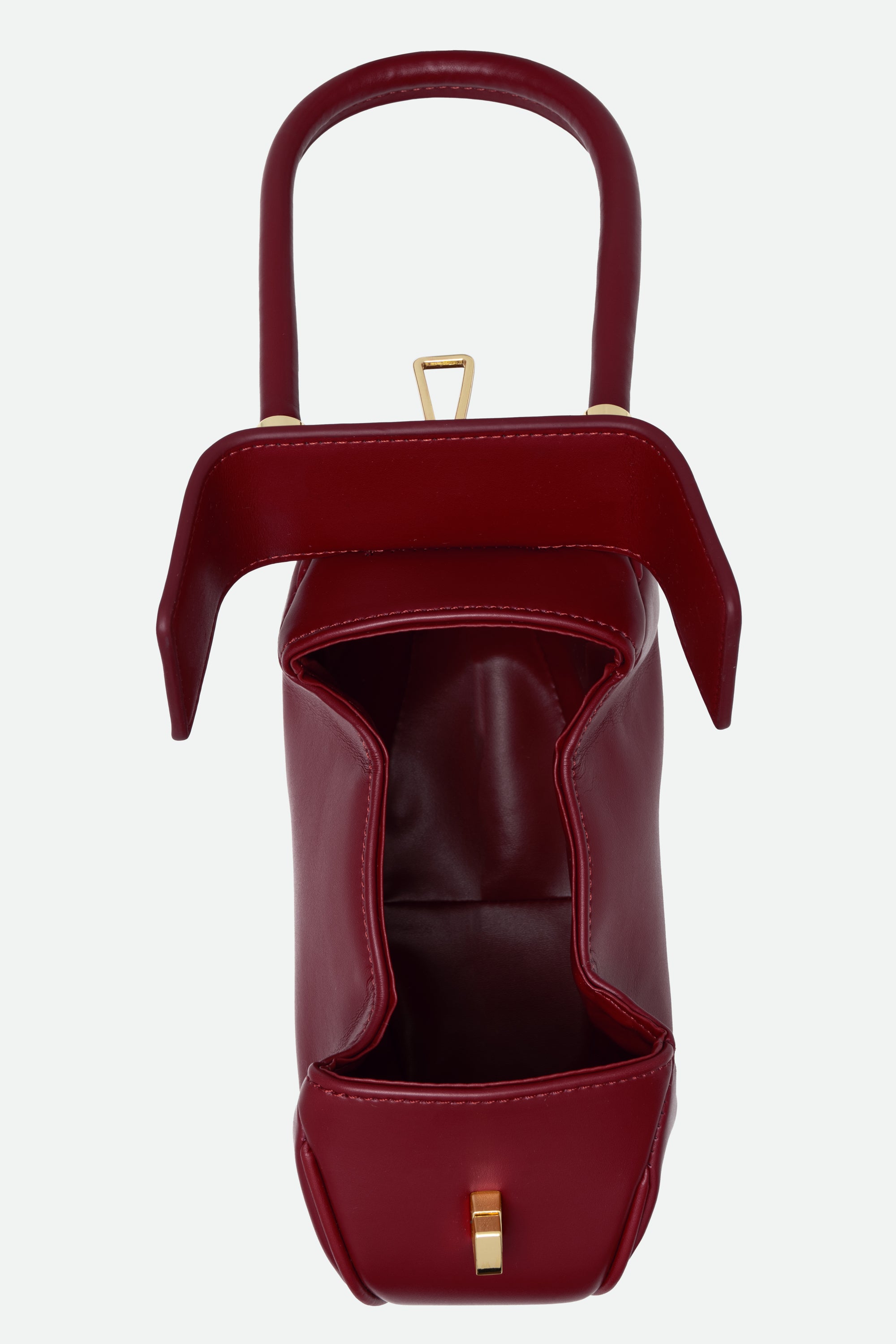 Red handbag with a gold clasp on a white background