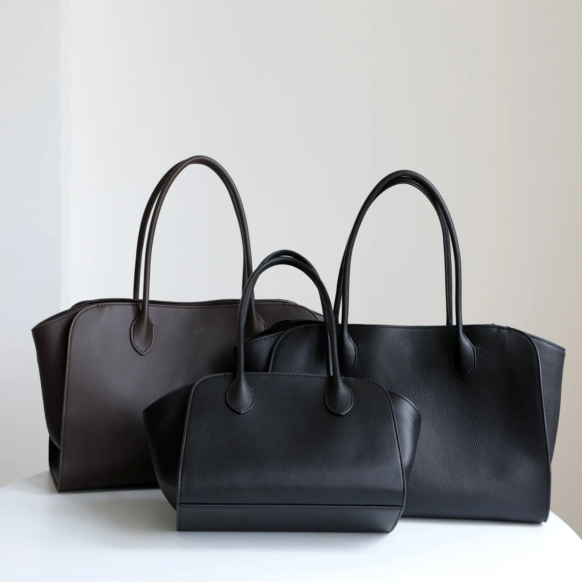 Valentina Volta Small shoulder bag in Coffee, side view