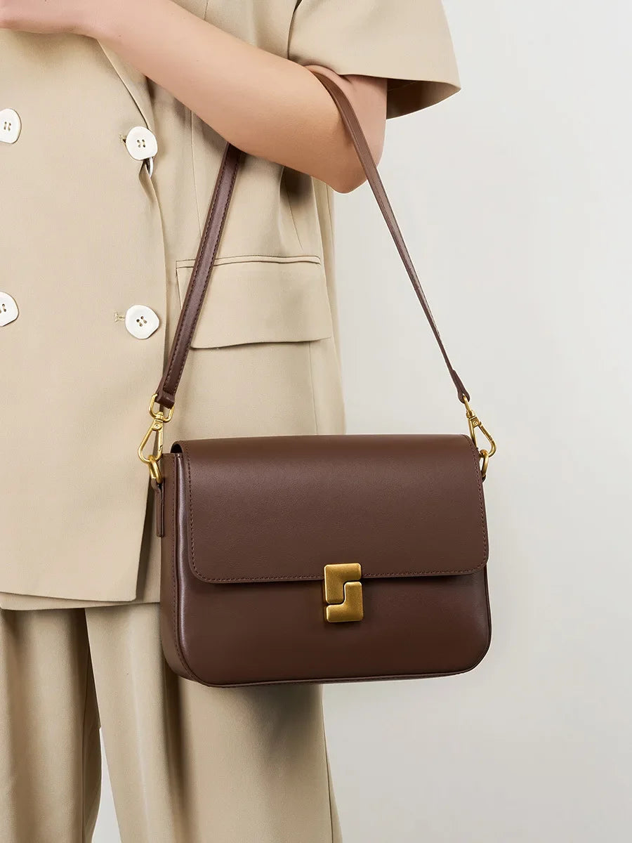 Valentina Monte crossbody bag in Coffee, side view