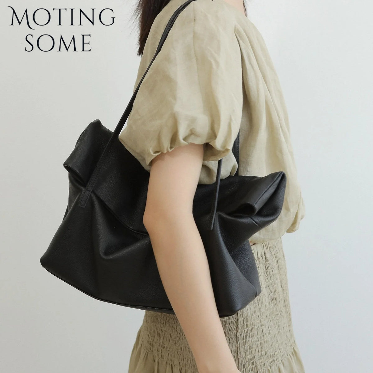 Valentina Ambra tote in Black, worn