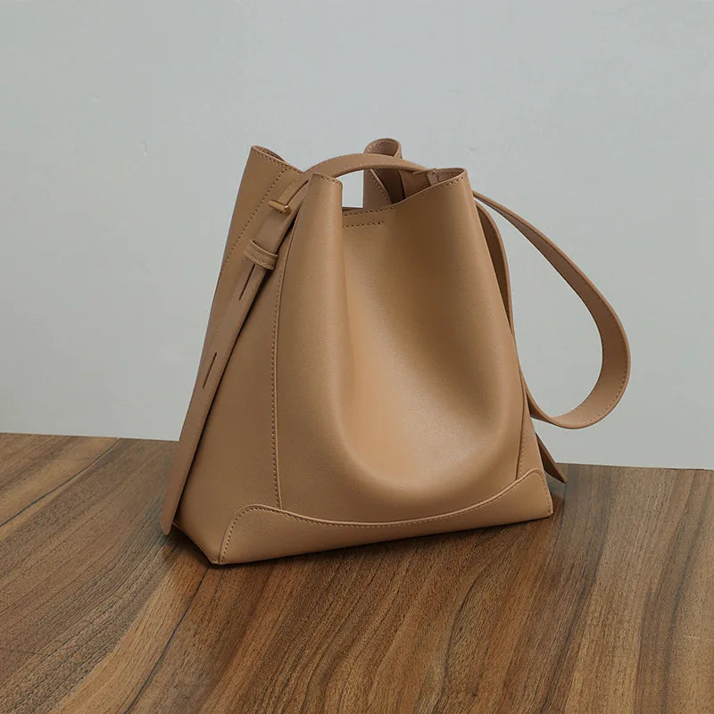 Valentina Calce bucket bag in Dark Brown, worn